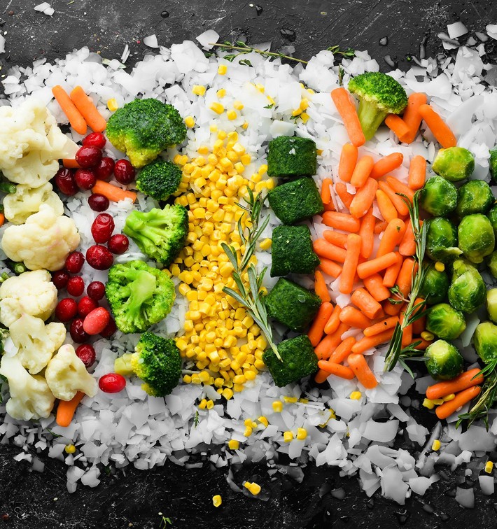 Fresh vegetables are packed and displayed using flake ice from a MAJA flake ice machine